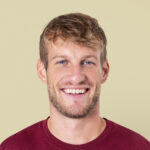 Handsome man smiling, happy face portrait close up